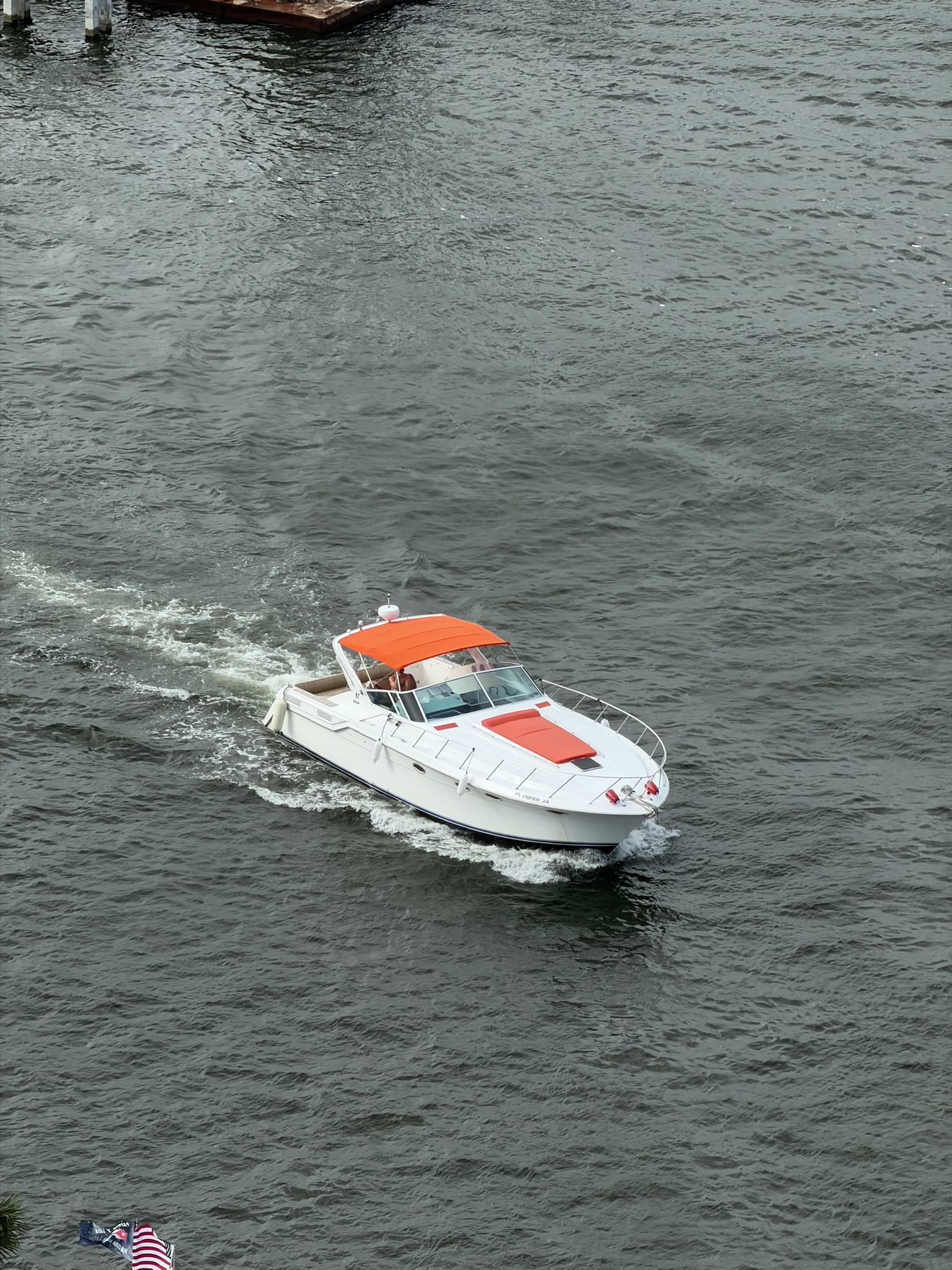 Aerial view of the MCA charter yacht in blue Miami water